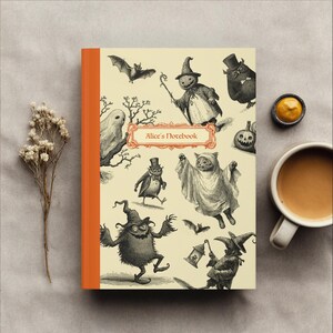 May include: A Halloween-themed notebook with an orange spine and a cream-coloured cover. The cover features vintage illustrations of bats, ghosts, and other spooky characters. The text "Alice's Notebook" is displayed in a decorative frame.