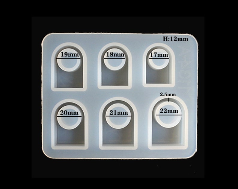 May include: Silicone mould with six ring-shaped cavities for making resin jewellery. The mould has six different sizes: 17mm, 18mm, 19mm, 20mm, 21mm, and 22mm. The mould is 12mm high.