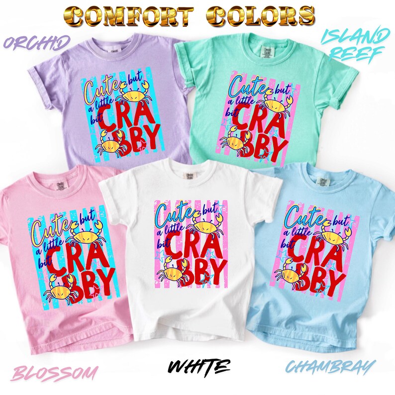 May include: Comfort Colors t-shirts in orchid, island reef, blossom, white, and chambray. Each shirt features a graphic with a crab and the text "Cute but a little crabby".