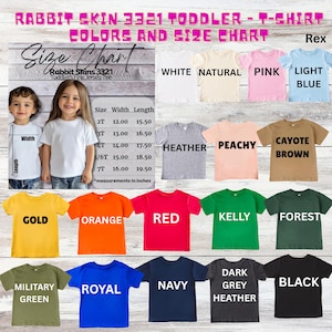 Puede incluir: Una tabla de colores y tallas de camisetas para ni&ntilde;os peque&ntilde;os Rabbit Skins 3321 que muestra una cuadr&iacute;cula de camisetas de manga corta en varios colores, incluyendo blanco, rosa, azul claro, jaspeado, melocot&oacute;n, marr&oacute;n, oro, naranja, rojo, kelly, bosque, verde militar, real, marino, gris oscuro jaspeado y negro, con una tabla de tallas en pulgadas.