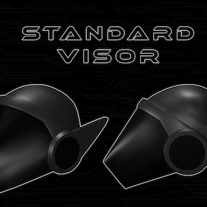 May include: Two black helmets with a visor and a circular detail on the side. The text "STANDARD VISOR" is displayed above the helmets.