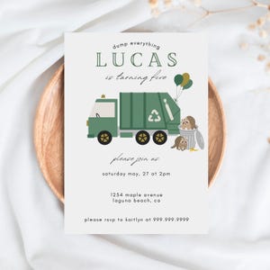 May include: A birthday invitation with a green garbage truck illustration, the text "LUCAS is turning five", and the words "please join us". The invitation includes the date, time, and location.