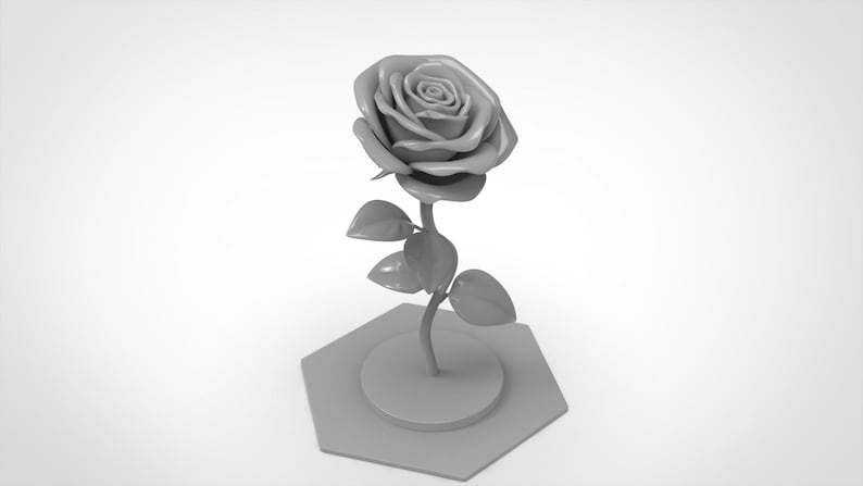 May include: A solid light gray rose sculpture featuring a detailed flower head with layered petals, a slender stem with three distinct leaves, and a circular base attached to a flat hexagonal platform, all rendered in a uniform matte finish.