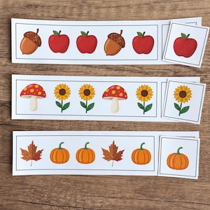 Preschool pattern activity with fall-themed cut and match cards for hands-on learning.