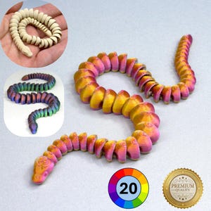 May include: A colourful, articulated snake toy. The main snake is a gradient of yellow, pink, and purple. Additional images show a white and brown snake, and a rainbow-coloured snake. A colour wheel with the number 20 is also present.