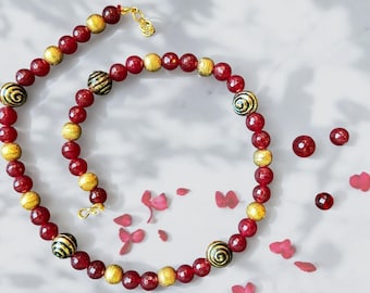 Deep Red Beaded Necklace with Alternating Green Circular Accents – Rhythmic, Bold & Elegant