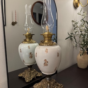 antique cherub oil lamp turned electric