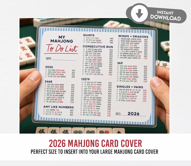 May include: A clear plastic Mahjong To Do List card with a blue and white border, held by hands. The card features lists for Quint, Consecutive Run, Winds + Dragons, 369, Singles + Pairs, and other Mahjong combinations. The text "2026" is visible.