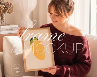 Vertical Frame Mockup with Person, DIN A Poster, Woman Holding Wall Art Display (PSD File)