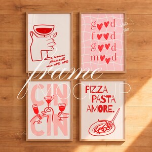 May include: Four framed wall art prints with red line art illustrations on light backgrounds. The prints feature wine glasses, hearts, the text "someone please call nine WINE WINE", "good food good mood", "CIN CIN", and "PIZZA PASTA AMORE."