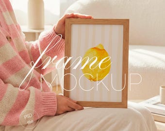 2:3 Vertical Frame Mockup with Person, Interior Home, Wood Wall Art Display (PSD File)
