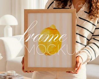 4:5 Vertical Wood Frame Mockup, Person Holding Frame, Wall Art Display (PSD File)