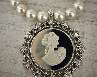 Elegant Pearl Necklace and Large Vintage Cameo Pendant Surrounded By Rhinestones