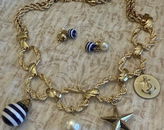 This Vintage Massive Gold Tone Chain Necklace with Nautical Charms and Dangles