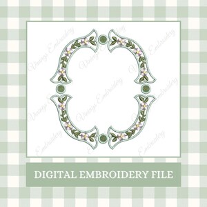 May include: A digital embroidery file featuring a floral design with a light blue frame. The frame is adorned with delicate white and pink flowers and green leaves. The text "DIGITAL EMBROIDERY FILE" is at the bottom.