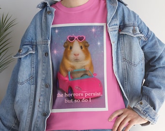 Funny Guinea Pig Tee: "The Horrors Persist" Graphic Unisex Shirt