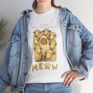 Funny Sheep Cat Tee, Unisex Cotton T-Shirt for Animal Lovers, Casual Everyday Wear, Gift for Him or Her, Sheep Lover Shirt, Pet Owner Gift,