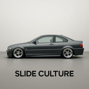 May include: A dark grey coupe with silver rims, lowered suspension, and tinted windows. The car is parked on a grey surface. The text "SLIDE CULTURE" is displayed in large, bold, black letters at the bottom of the image.