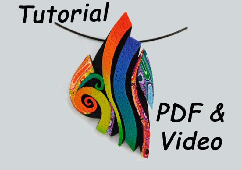 May include: A colorful polymer clay pendant with a rainbow design and swirls. The pendant is on a black cord and the text "PDF & Video" is in the lower right corner of the image.