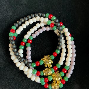 Pulsera de cuentas redondas pequeñas de porcelana Danty (4 mm)
