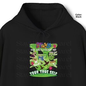 May include: Black hoodie with a graphic design featuring the text "STAY" in green and blue, along with the phrases "LET YOUR FREAK OUT", "ME", and "YOUR TRUE SELF". The design includes an image of Frankenstein's monster.