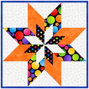 May include: A colorful quilt block with a star design. The star is made up of orange, black, white, and a fabric with multi-colored polka dots on a black background.