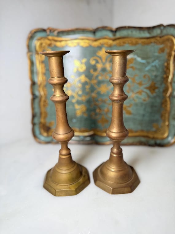 Vintage antique solid brass candlestick holders for taper candles featuring a classic baluster-style silhouette wedding centerpiece decor