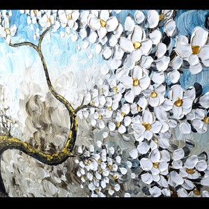 May include: A painting of a white flowering tree with a thick, gold-colored trunk against a blue and gray background. The flowers are painted in a textured style, giving the painting a three-dimensional effect.