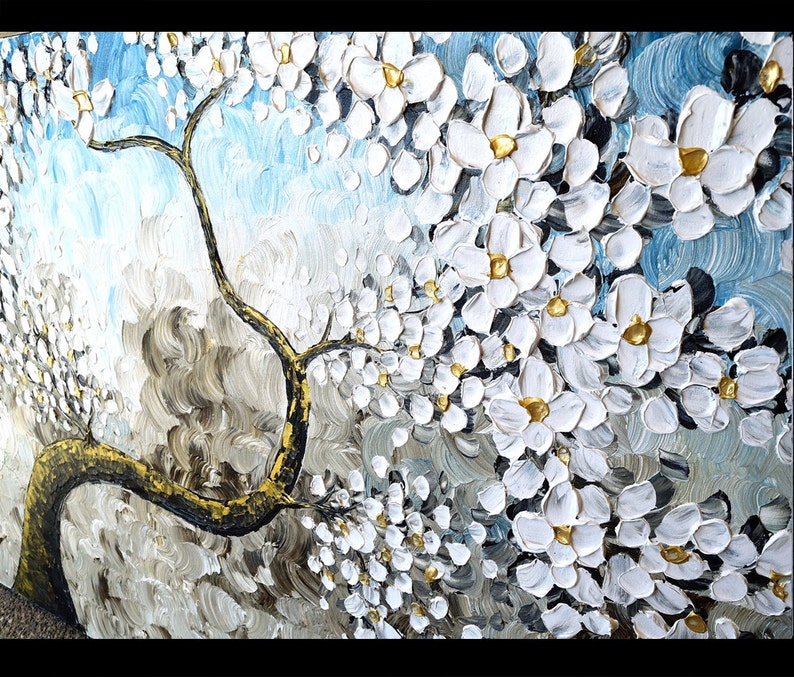 May include: A painting of a white flowering tree with a thick, gold-colored trunk against a blue and gray background. The flowers are painted in a textured style, giving the painting a three-dimensional effect.