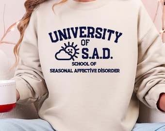 Sudadera de la Universidad de S.A.D., salud mental, psicología, humor, invierno, depresión, cuello redondo, trastorno afectivo estacional, regalo
