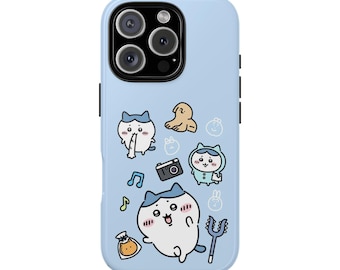 May include: A light blue phone case featuring cartoon cat characters and other playful illustrations. The case has a camera cutout and black side buttons. The design includes musical notes, a camera, and a small bag.