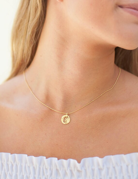 gold moon and sun necklace