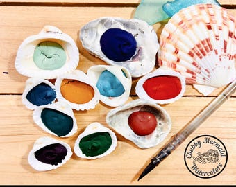 She Sells Seashells, with paint! A collection of 10 little sea shells with granulating, natural earth pigments. Handmade by an Artist.