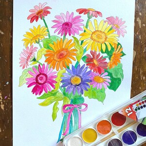 May include: A watercolor painting of a bouquet of colorful flowers, including pink, yellow, orange, red, and purple flowers. The flowers are tied together with a pink ribbon and are arranged in a vase. A watercolor paint set is visible in the bottom right corner of the image.