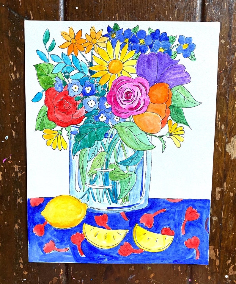 May include: A colorful bouquet of flowers in a glass jar, with lemons on a blue background with red accents.
