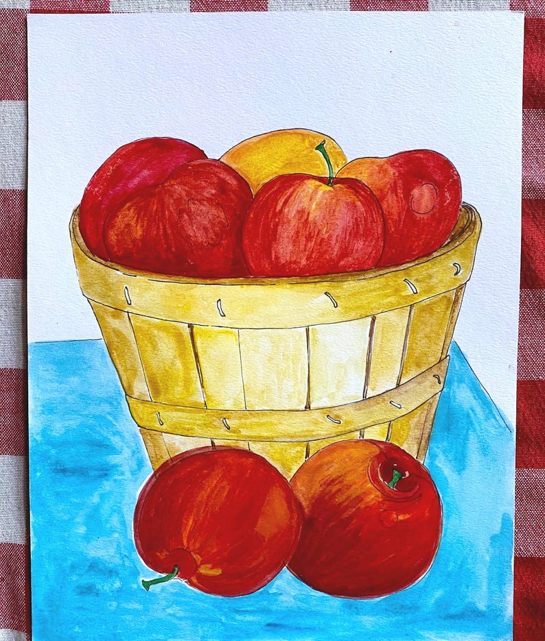 May include: A watercolor painting of a basket filled with red and yellow apples. The basket is made of woven wood and has a light brown color. The apples are arranged in a pile, with some spilling out of the basket. The background is a light blue color.