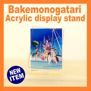 May include: Acrylic display stand featuring a colorful anime illustration. The stand has a clear base and a rectangular display area with a red border. The text "Bakemonogatari Acrylic display stand" is at the top. A blue circle with "NEW ITEM" is in the corner.