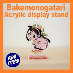 May include: Acrylic display stand featuring a cartoon character with a pig-like creature. The stand has a red base and the text "Bakemonogatari Acrylic display stand" in orange. A blue circle with "NEW ITEM" is in the lower left.
