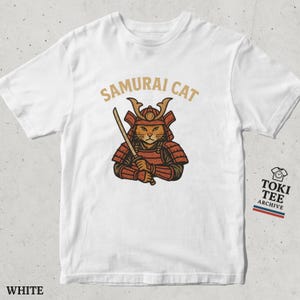 Samurai Cat Graphic T-Shirt / Funny Japanese Warrior Cat Tee with Katana and Armor Design for Cat Lovers and Anime Style Enthusiasts