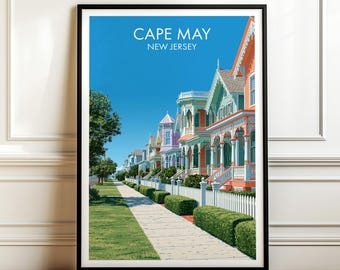 May include: A framed art print featuring a row of colorful Victorian houses in Cape May, New Jersey. The scene depicts a sidewalk, a white picket fence, and manicured hedges under a clear blue sky. The text CAPE MAY NEW JERSEY is at the top.