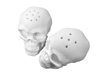 Skull style salt and pepper shakers.