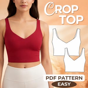 May include: A red crop top with a V-neck design. The image also includes a white line drawing of the crop top and the words "CROP TOP" and "PDF PATTERN EASY". The model is wearing white leggings.