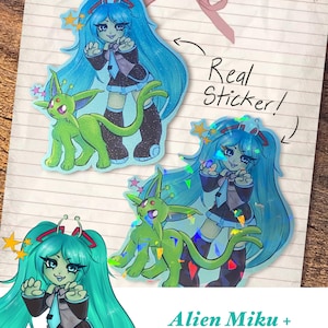 May include: Holographic stickers featuring an anime-style character with long blue hair and a green alien-like creature. The stickers have a sparkly finish and the text "Real Sticker!" is visible. The text "Alien Miku + Shiny Espeon" is also present.