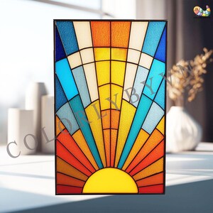 May include: A rectangular stained glass panel with a sunrise design. The artwork features a vibrant colour palette of yellow, orange, red, blue, and white, arranged in a radial pattern. The panel is framed in black.