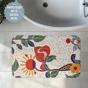 May include: Rectangular bath mat with a mosaic floral design. The mat features a red rose, yellow sun, and blue and yellow flowers. The text on the mat says "PRINTED DESIGN NOT 3D NOT REAL MOSAIC".