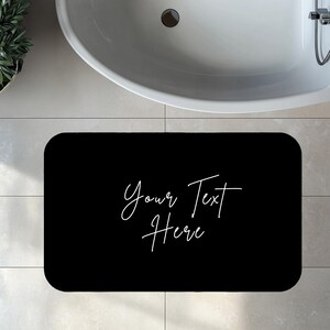 a bath mat that says your text before