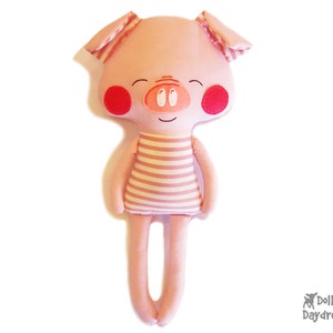 May include: A pink pig plush toy with a striped shirt and red cheeks. The pig has a small snout and a happy expression.