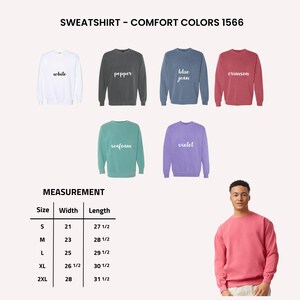 May include: A selection of Comfort Colors 1566 sweatshirts in various colors, including white, pepper, blue jean, crimson, seafoam, and violet. The image also includes a size chart with measurements in inches for sizes S through 2XL.