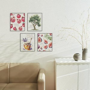 May include: Four framed art prints featuring botanical illustrations. The prints depict pomegranates, an olive tree, honey with lavender, and figs. The artwork has a vintage style with a neutral color palette, perfect for kitchen or dining room decor.
