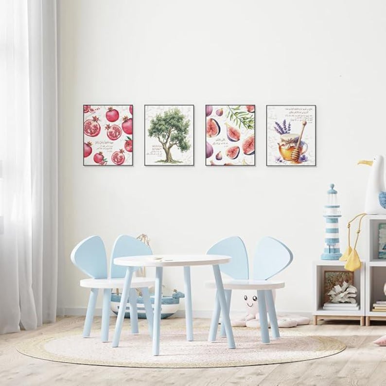 May include: Four framed art prints depicting pomegranates, an olive tree, figs, and a honey pot with lavender. A small white table and three light blue chairs are in front of the wall art. The chairs have a butterfly-like design.